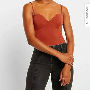 Express Body Contour red body suit sizee XS. In perfect condition!